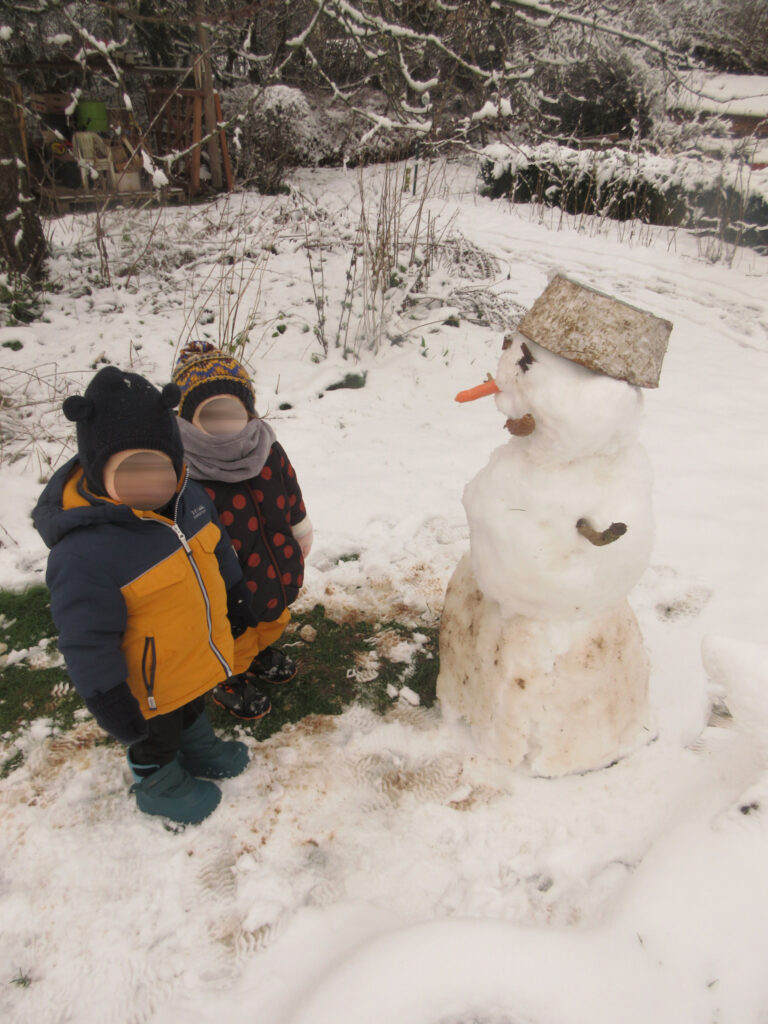 Avec le bonhomme de neige